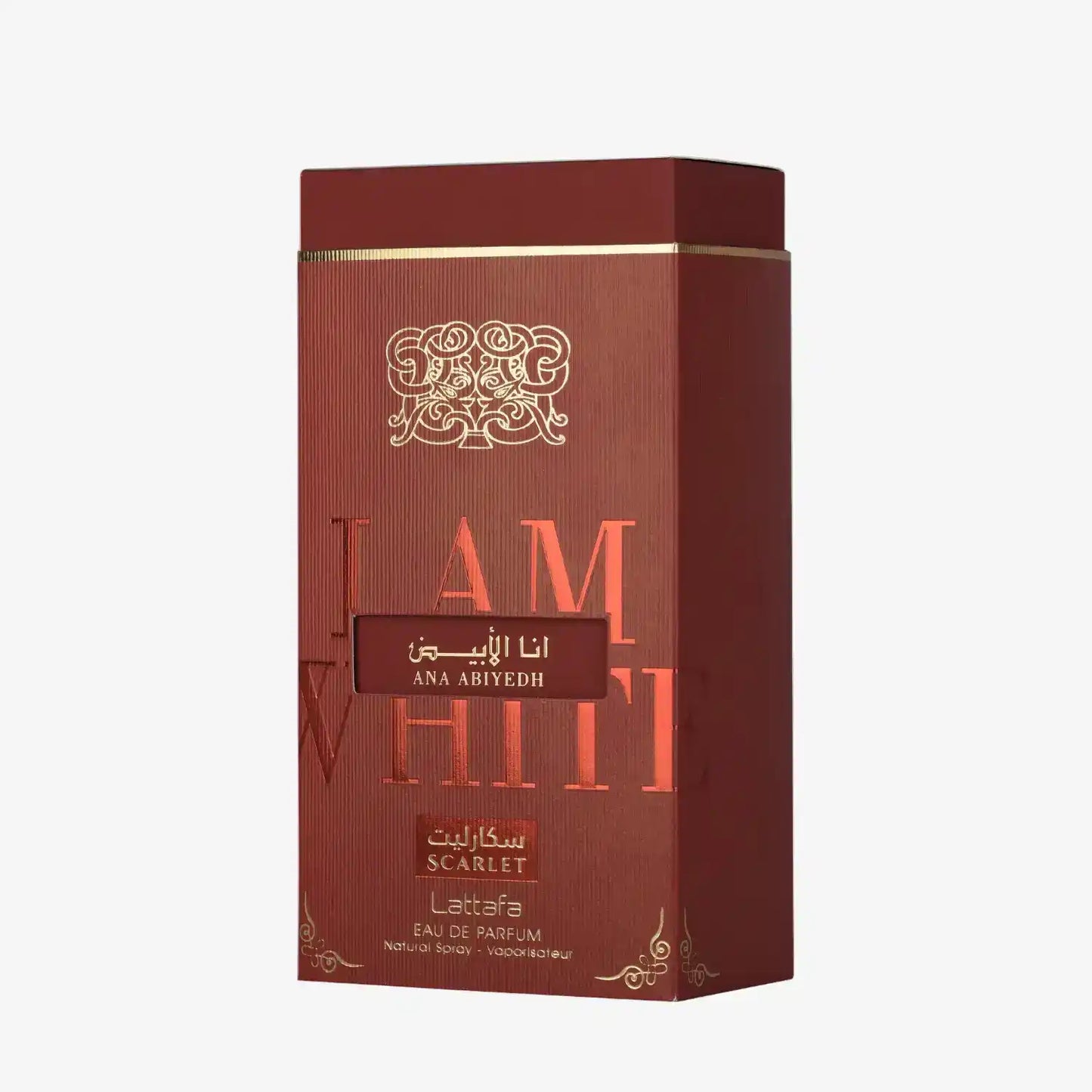 Red and gold ANA ABIYEDH SCARLET perfume box with Arabic and English text, elegant design