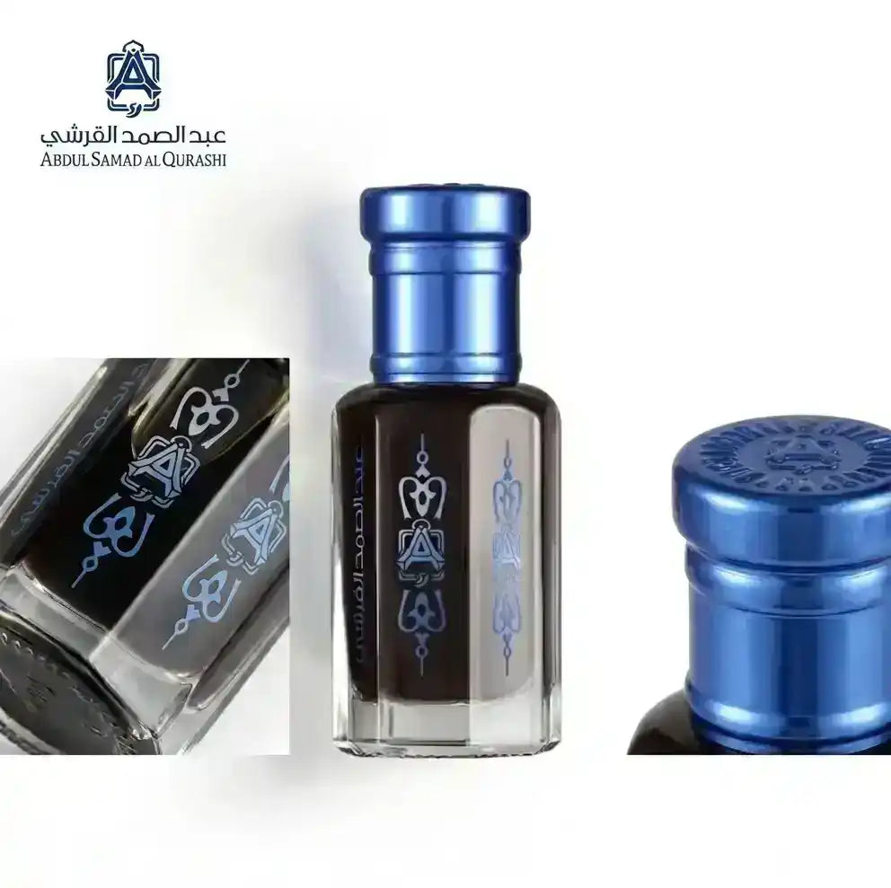 Abdul Samad Al Qurashi luxury perfume bottle with blue cap and Arabic calligraphy design