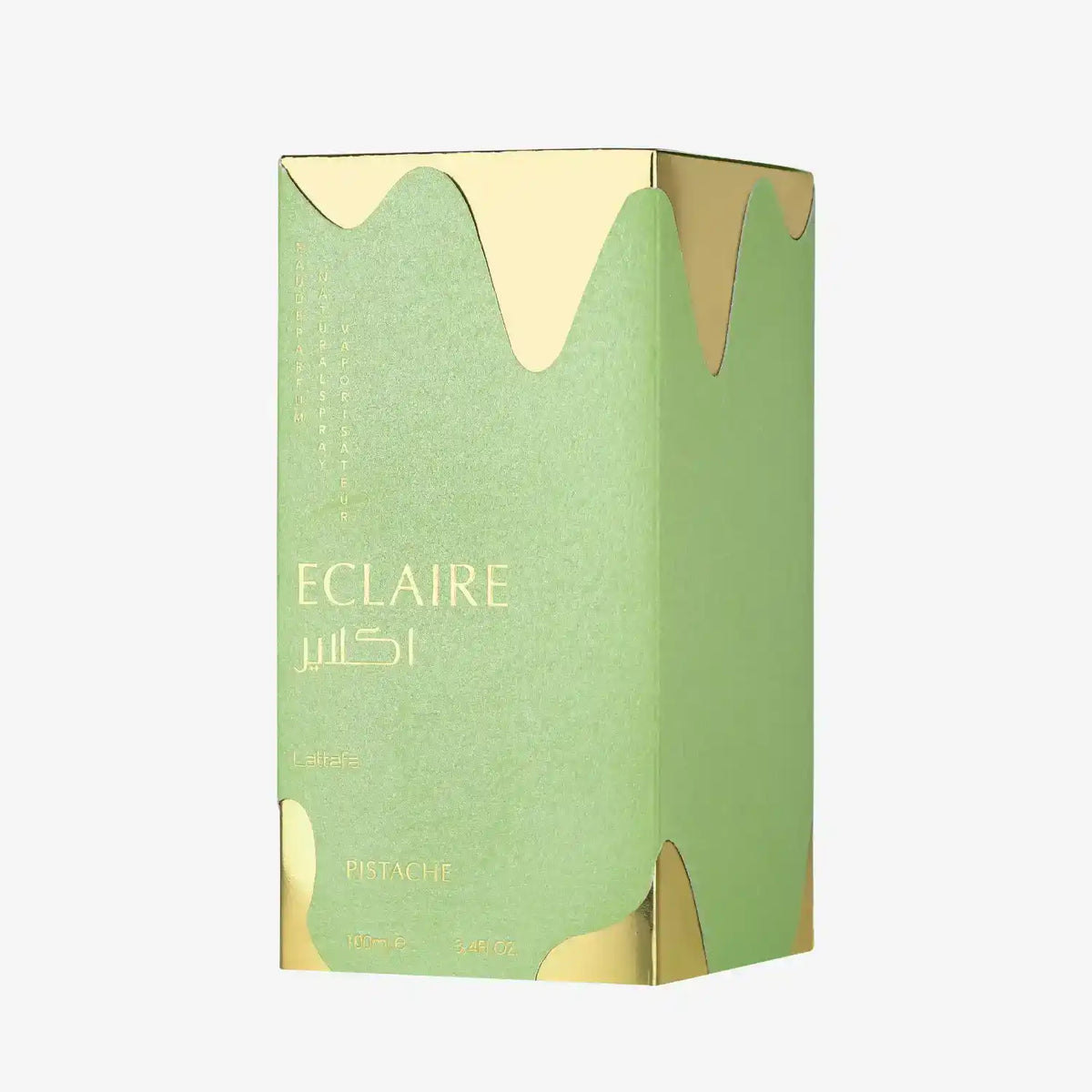 Green and gold Eclaire Pistache perfume box with elegant Arabic and English text.