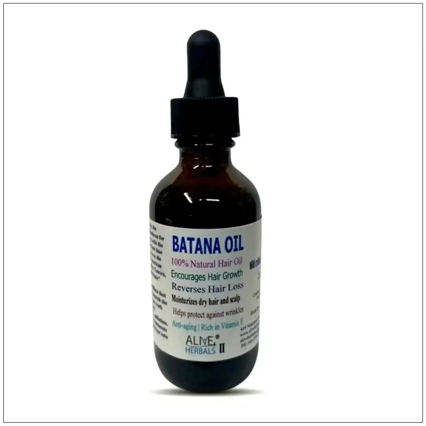 Dark glass bottle of Batana Oil with dropper, natural hair oil for growth and moisture