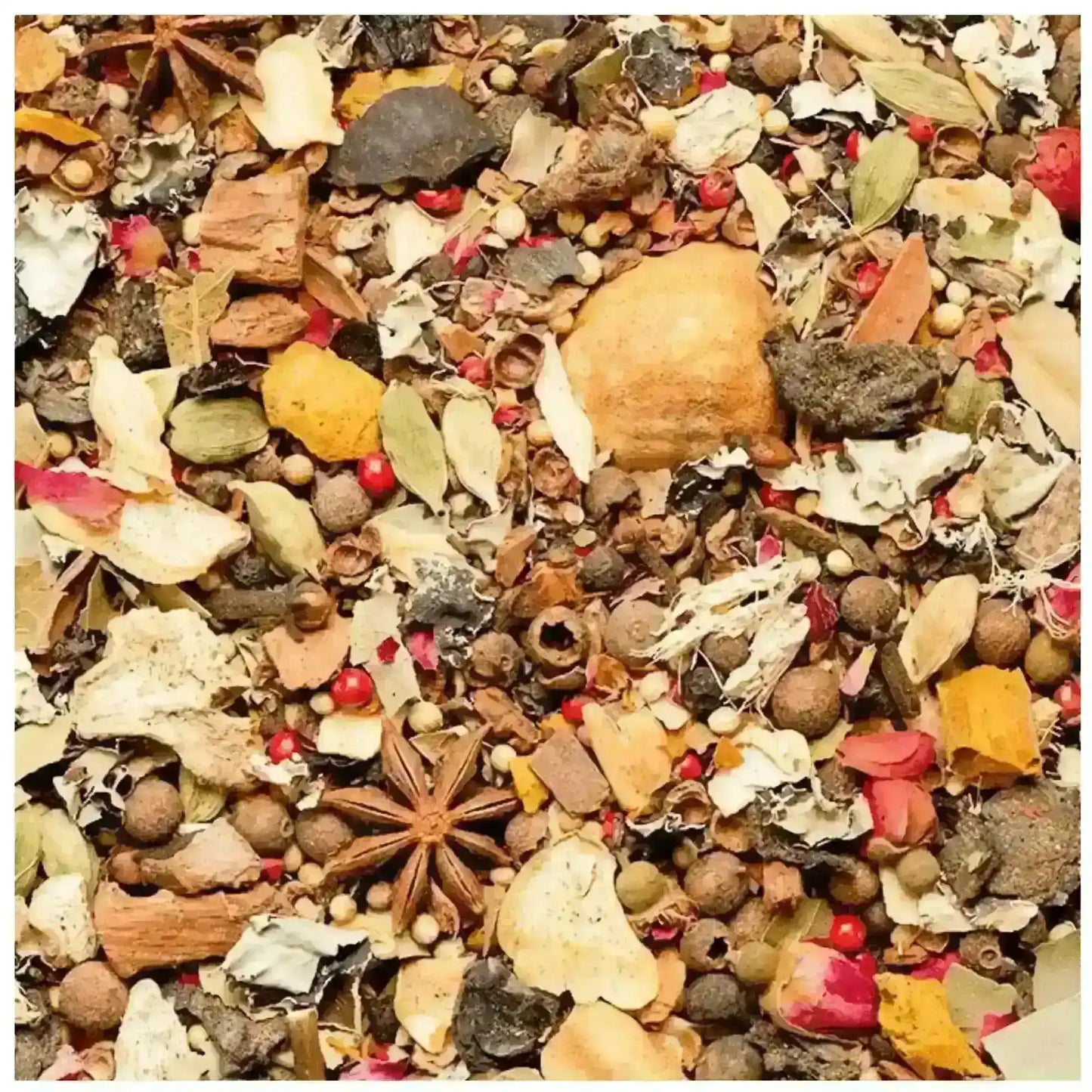 Close-up of authentic Middle Eastern kabsa spice blend with whole herbs and colorful spices