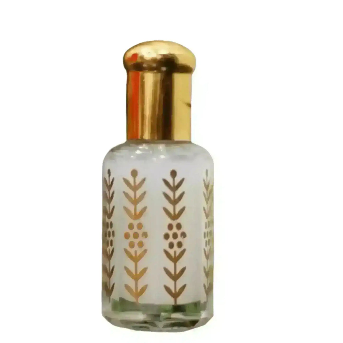 Clear glass bottle of pure Saudi thick perfume oil with gold floral design and cap