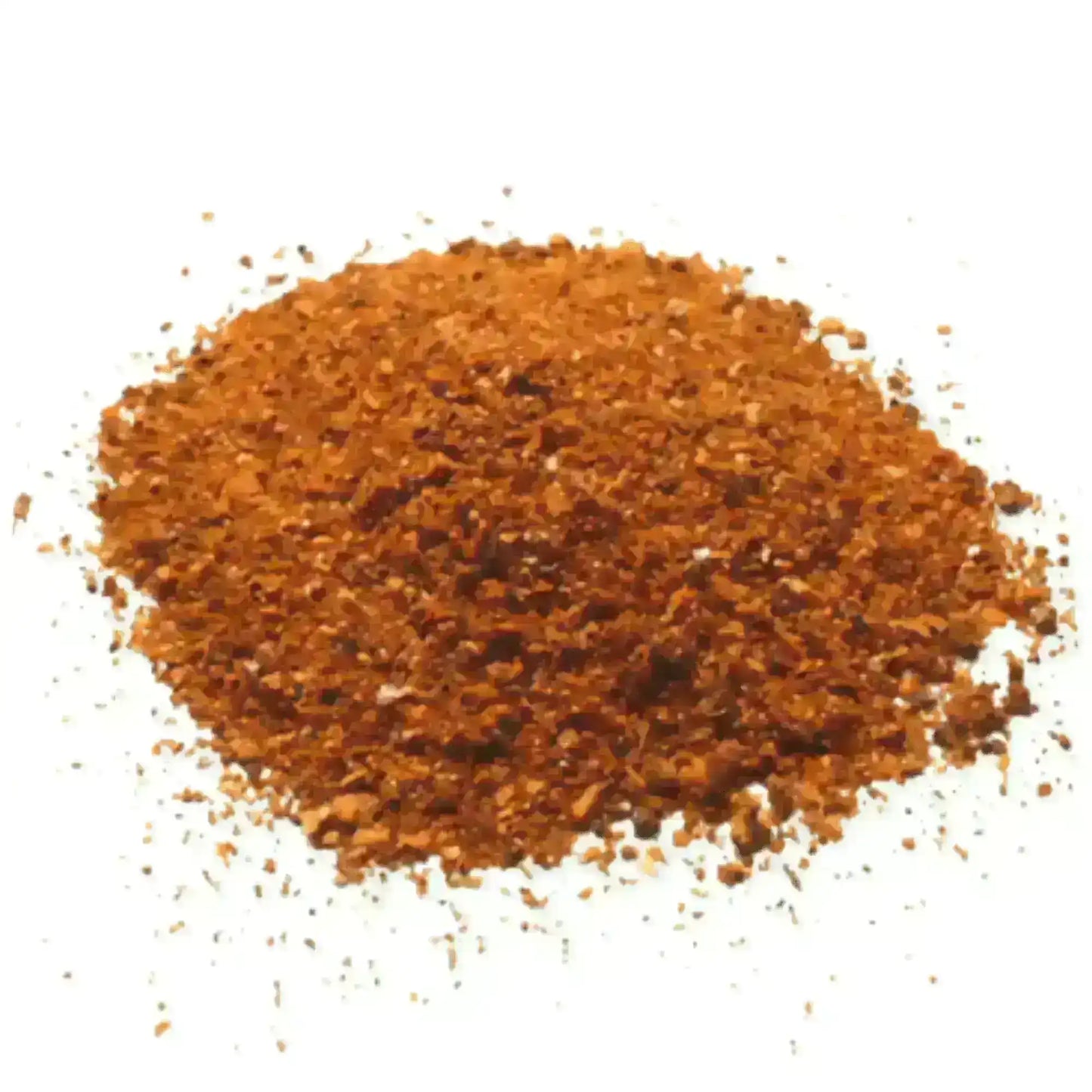 Pile of ground pastrami spices for Middle Eastern cooking on white background