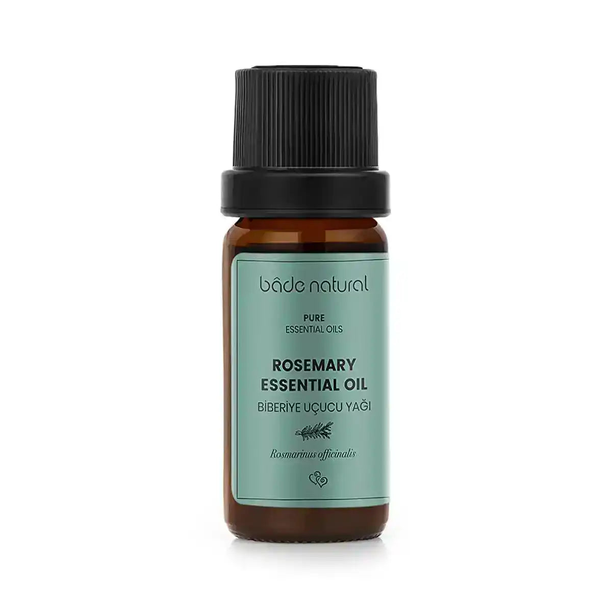 Pure rosemary essential oil in amber glass bottle with black cap, labeled bâde natural
