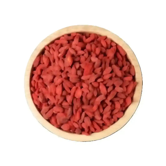 Wooden bowl filled with dried goji berries on a white background