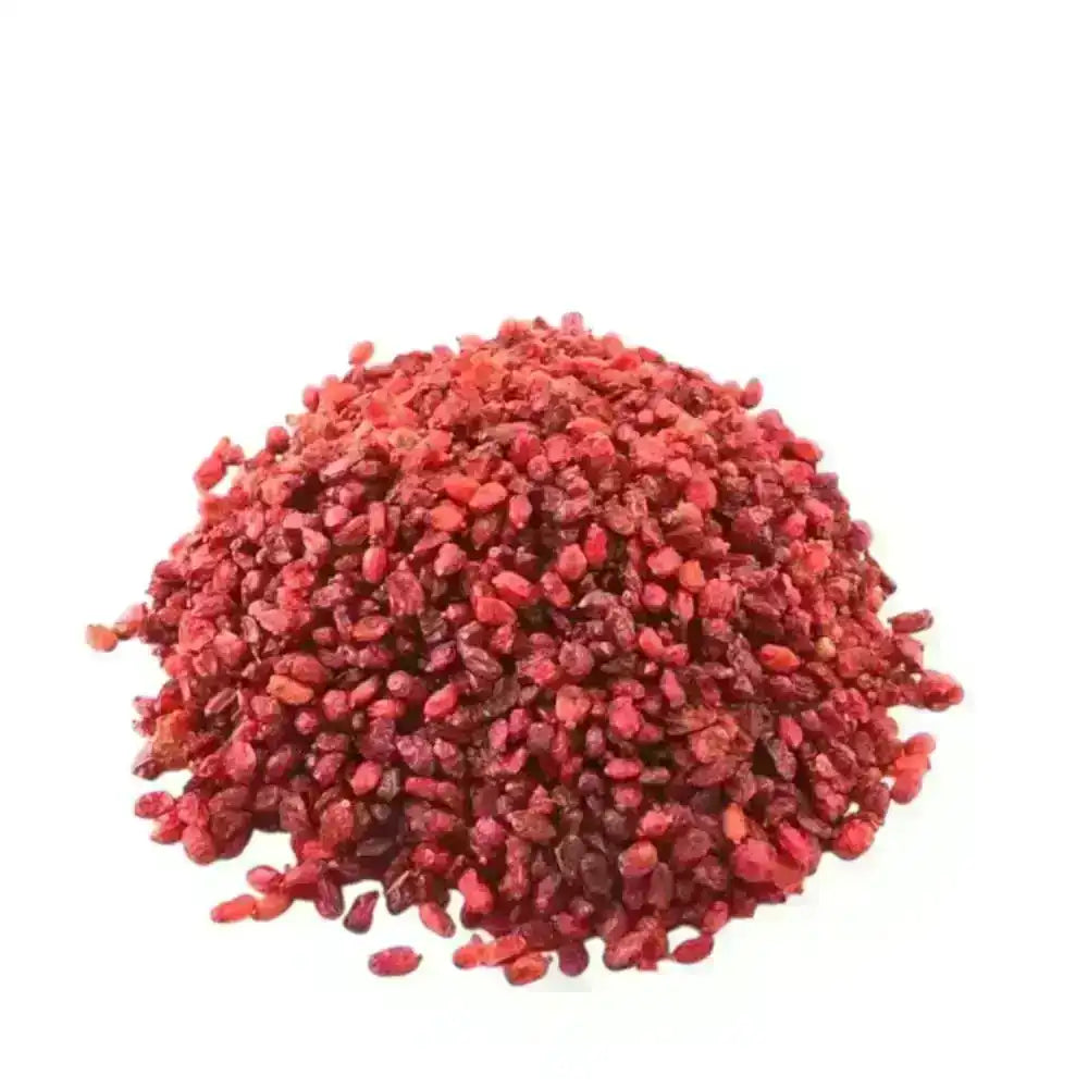 Pile of dried red barberries on a white background, authentic Middle Eastern spice