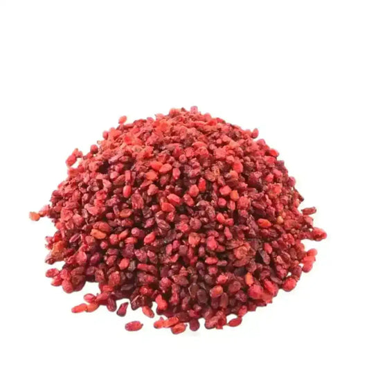 Pile of dried red barberries on a white background, Middle Eastern spice ingredient