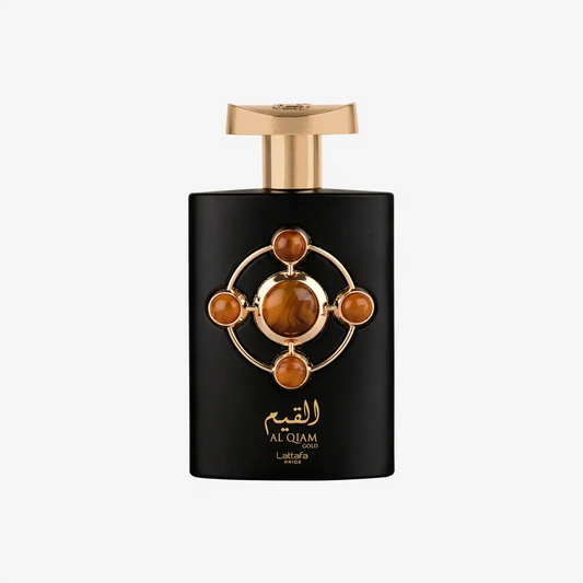 Black and gold Middle Eastern perfume bottle with decorative amber accents and Arabic text