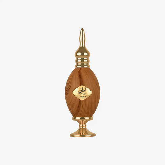 Middle Eastern perfume bottle with gold and wood tones, ornate pointed cap, white background