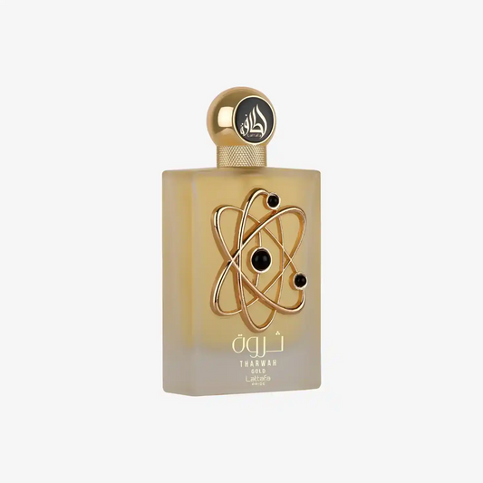 Tharwah Gold Lattafa perfume bottle with gold decorative design and Arabic script