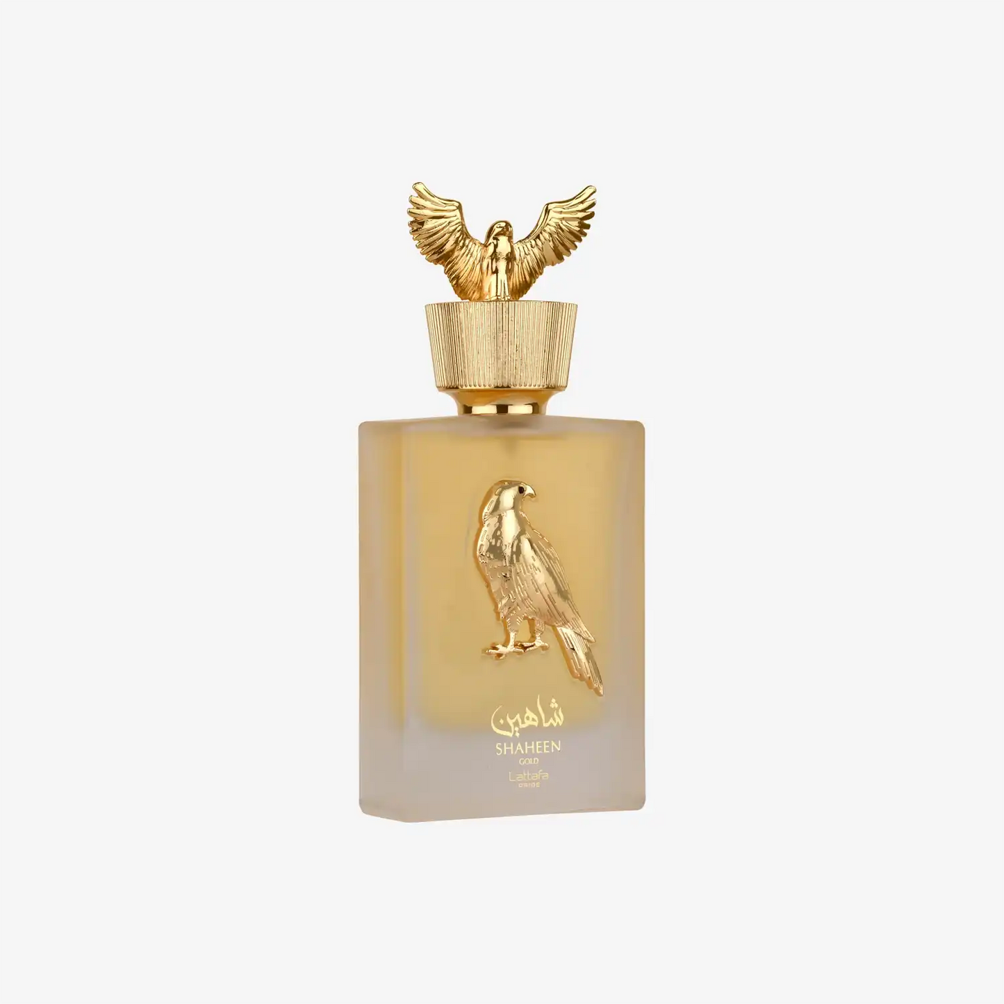 Middle Eastern perfume bottle with gold falcon emblem and Arabic script on frosted glass