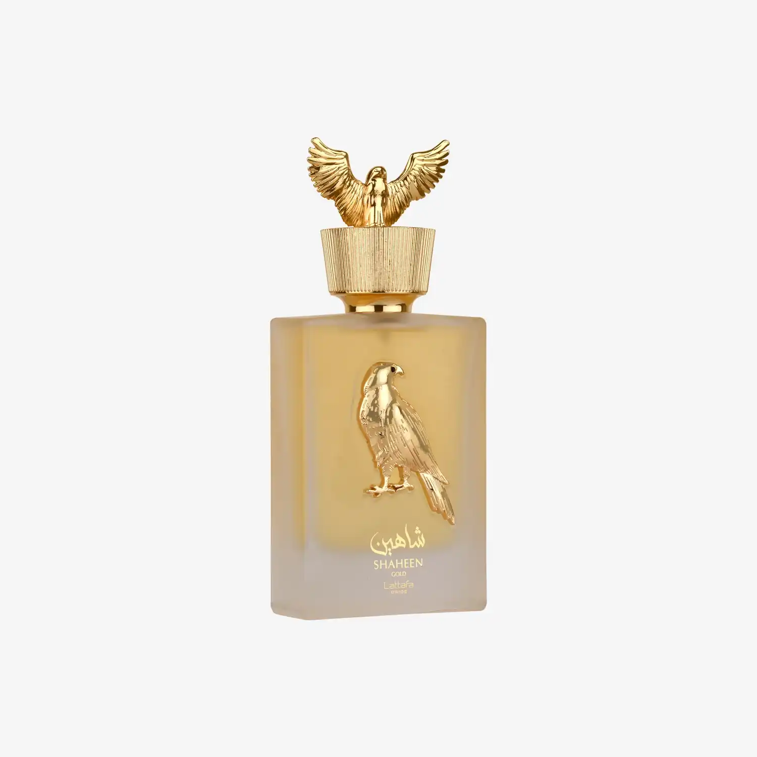 Middle Eastern perfume bottle with gold falcon emblem and Arabic script on frosted glass
