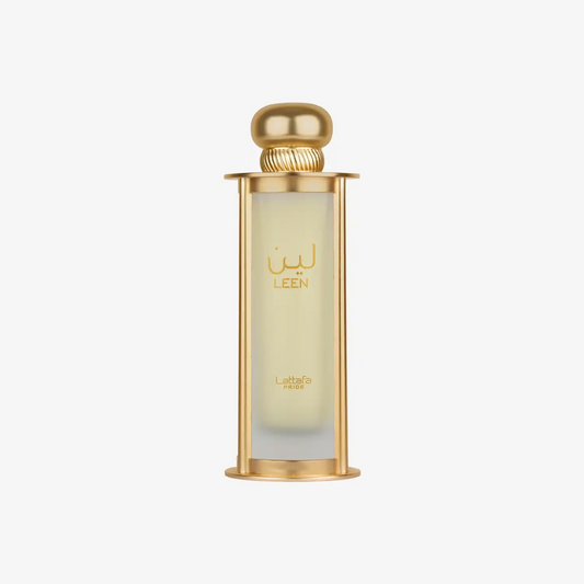 Elegant gold and glass bottle of Middle Eastern perfume labeled Leen and Lattafa Pride