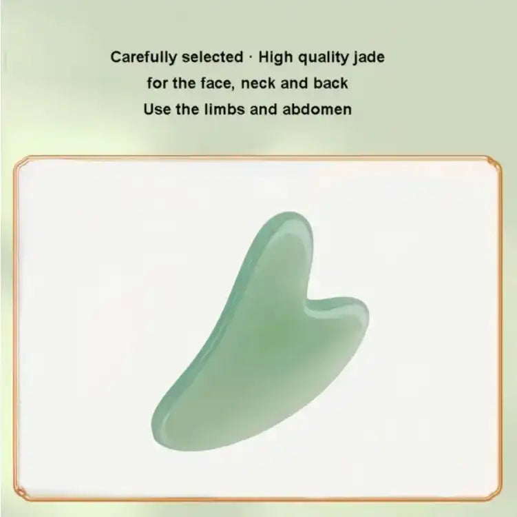 High quality jade gua sha tool on a light background for face, neck, and back massage