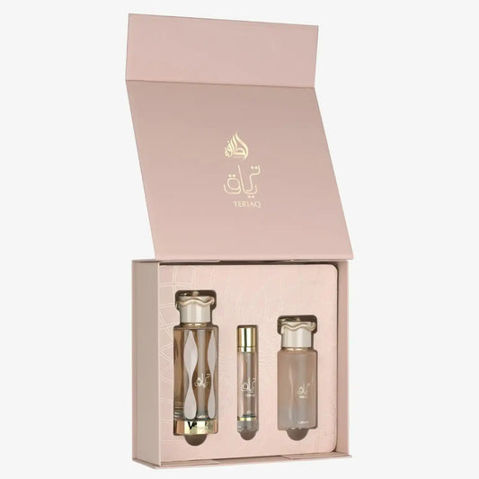 Luxury Middle Eastern perfume gift set with three elegantly designed fragrance bottles in a pink box