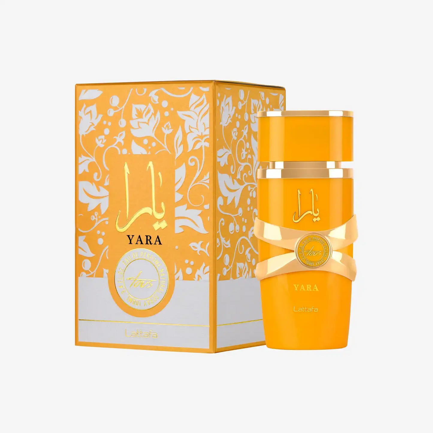 Lattafa Yara perfume bottle and floral-patterned box in gold and white, Middle Eastern fragrance