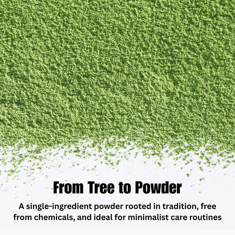 Green herbal powder spread on a white surface with text about traditional, chemical-free ingredients.