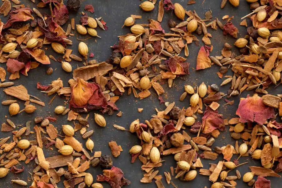 Dried Middle Eastern spices and herbs blend with rose petals and cardamom pods