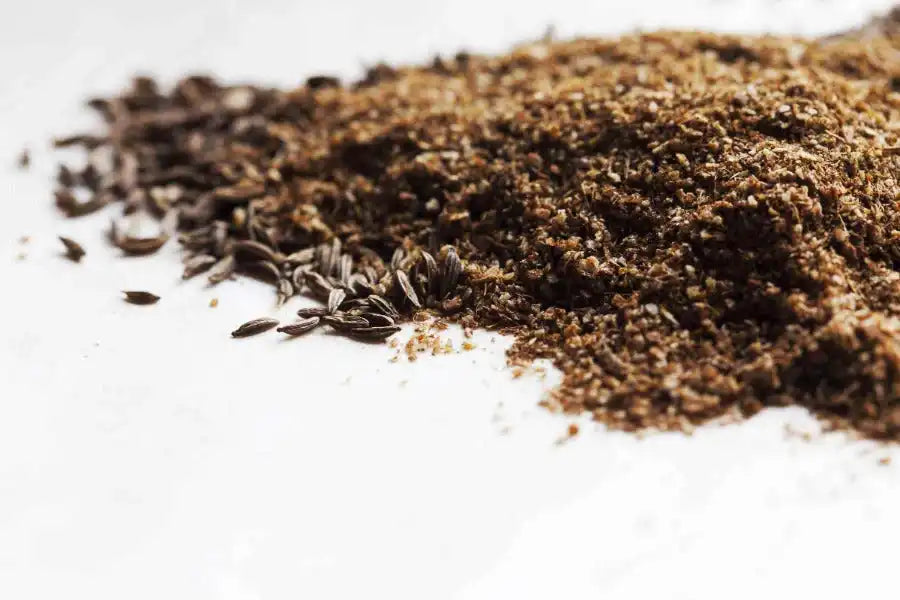 Ground Middle Eastern spice blend with whole cumin seeds, natural herbs for authentic cooking