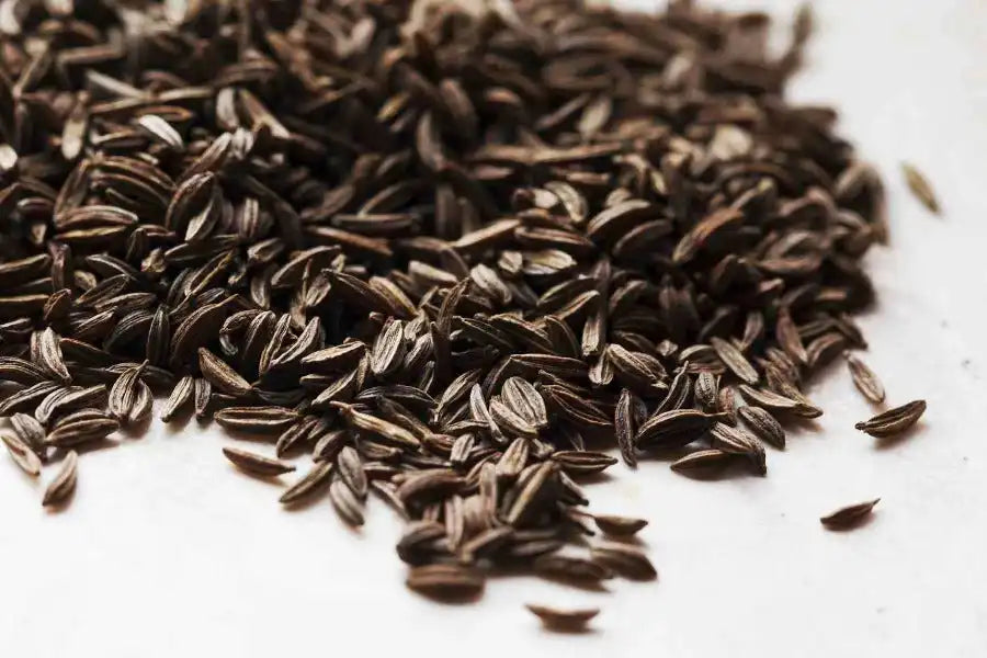 Dark brown Middle Eastern spice seeds, natural and aromatic, perfect for authentic cuisine
