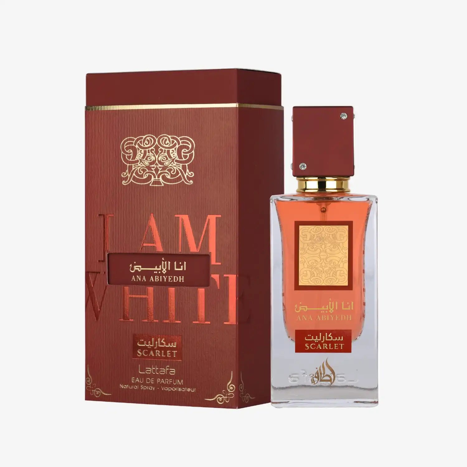 Ana Abiyedh Scarlet perfume bottle and box with gold Arabic design and red accents