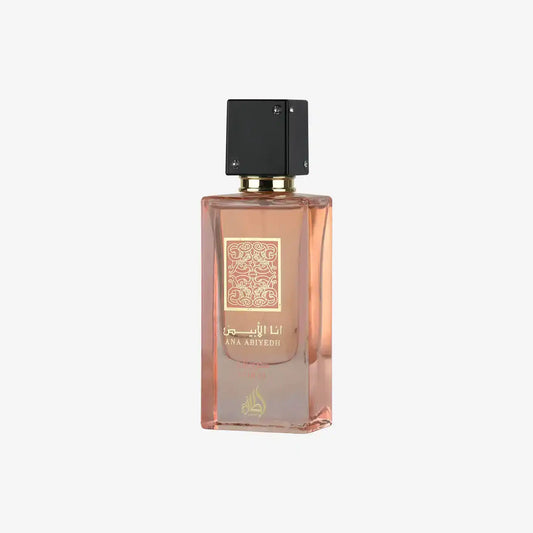 Elegant pink perfume bottle with Arabic script and ornate design, featuring a black cap and gold accents.