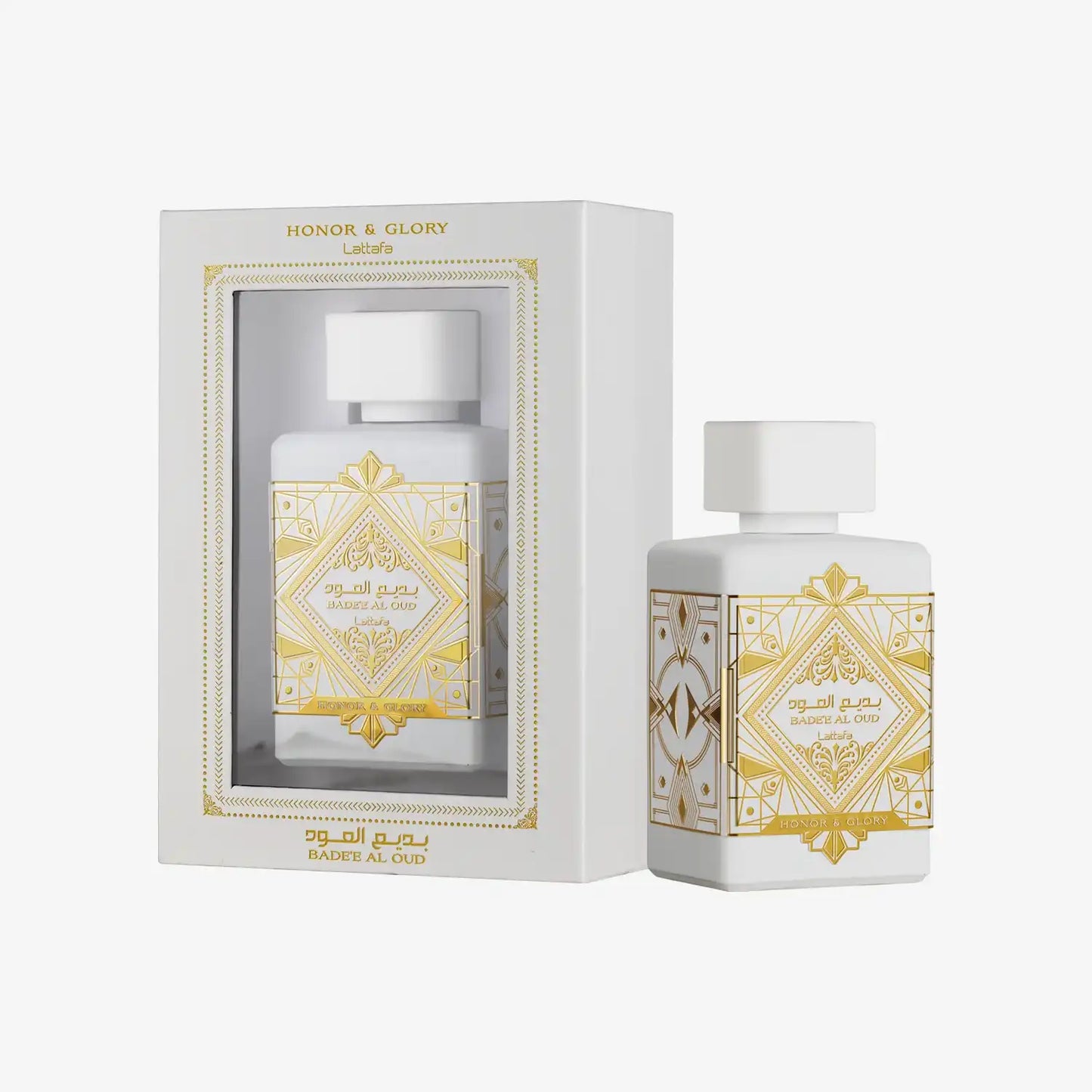 White and gold Badee Al Oud Honor & Glory perfume bottle with matching decorative box