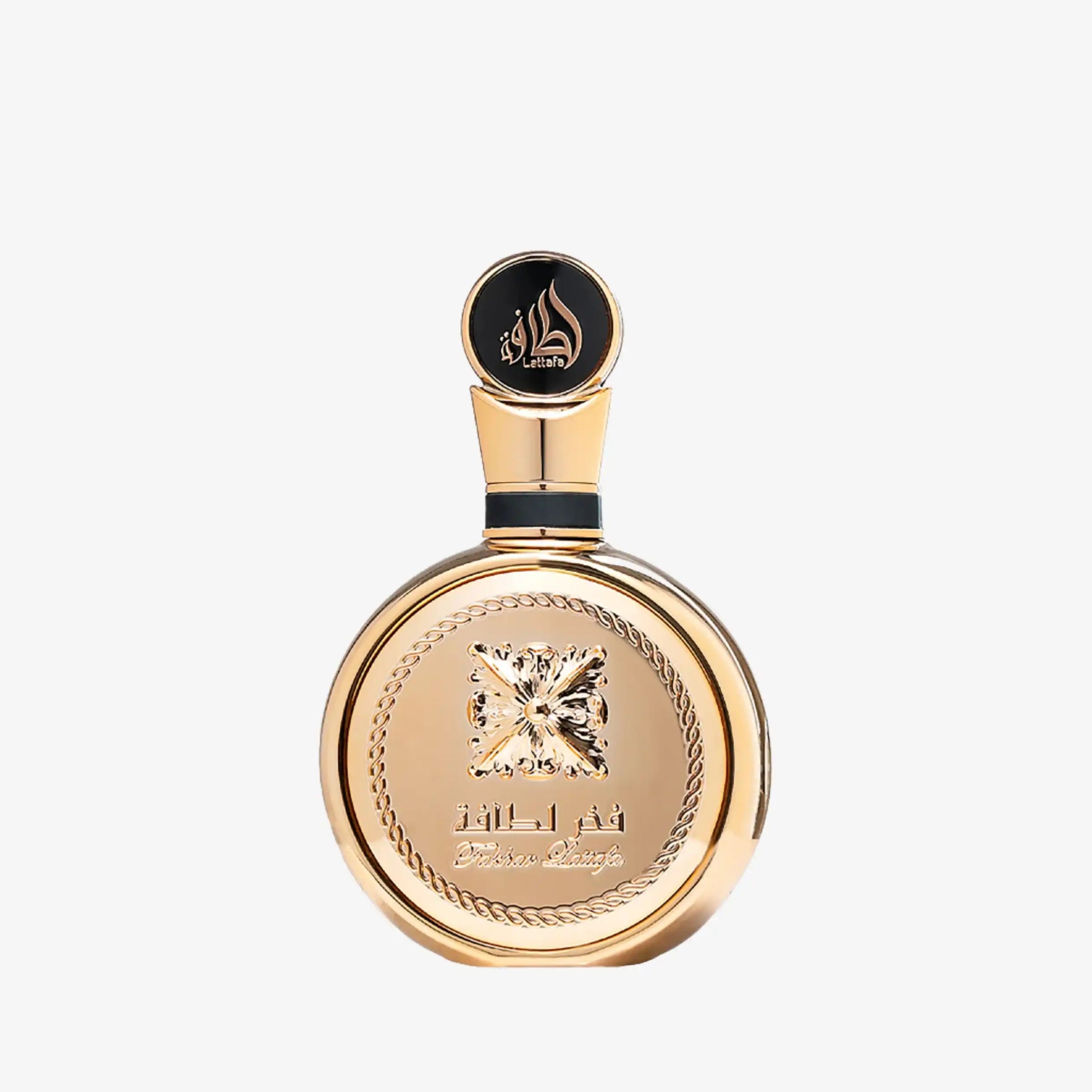 Elegant gold Middle Eastern perfume bottle with embossed design and Arabic calligraphy