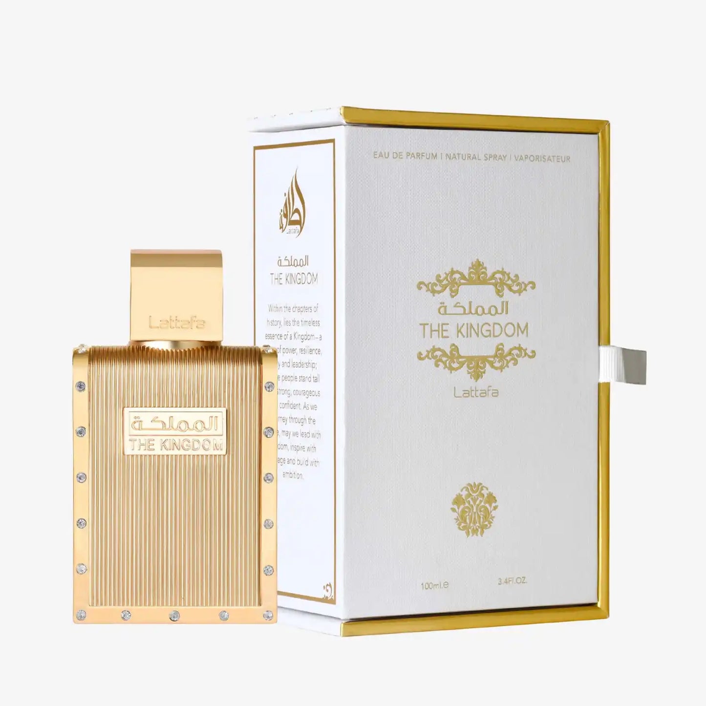 Lattafa The Kingdom perfume bottle and gold-trimmed box, luxury Middle Eastern fragrance