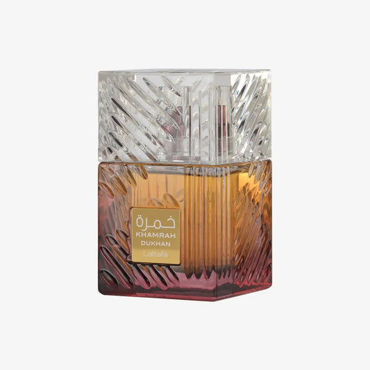 Khamrah Dukhan Lattafa perfume bottle with amber gradient glass and textured pattern