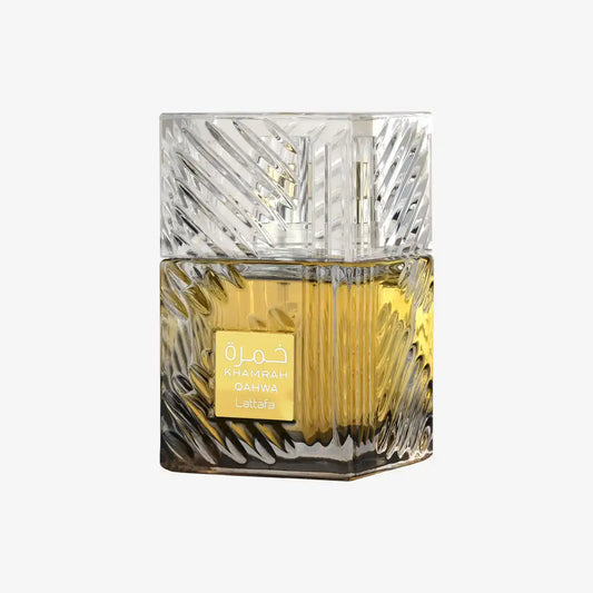 Khamrah Qahwa Lattafa perfume bottle with golden liquid and intricate glass design