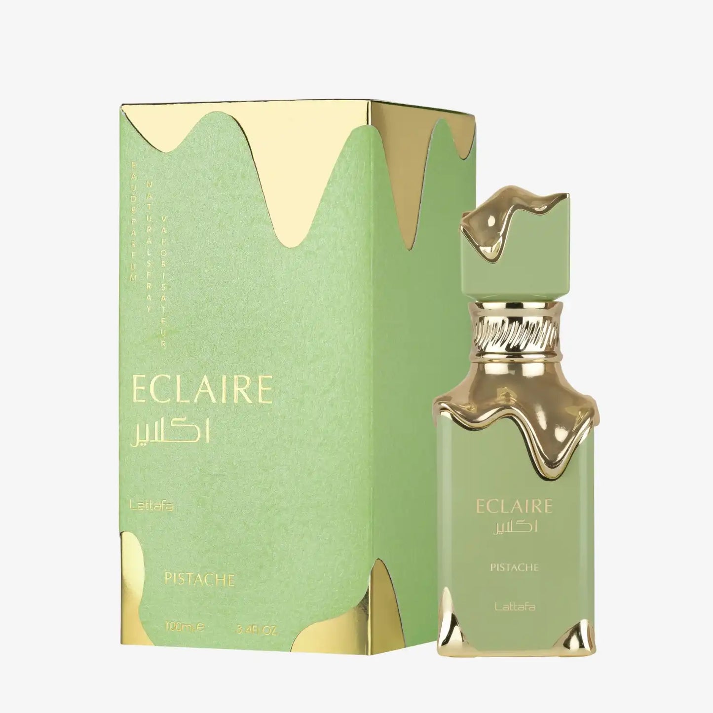 Lattafa Eclaire Pistache perfume bottle and box in gold and green with Arabic script