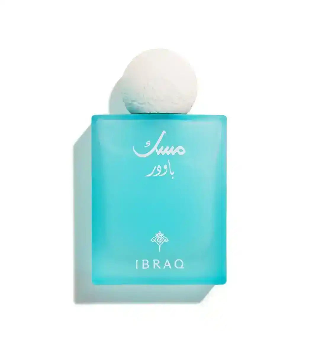 Turquoise Ibraaq perfume bottle with Arabic script and ornate white cap, Middle Eastern fragrance