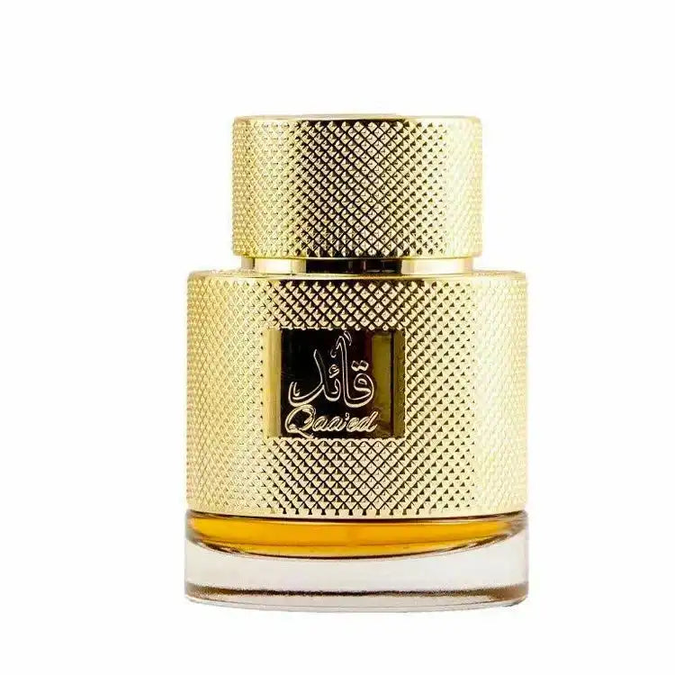Gold textured perfume bottle with Arabic script and clear base, Middle Eastern fragrance.