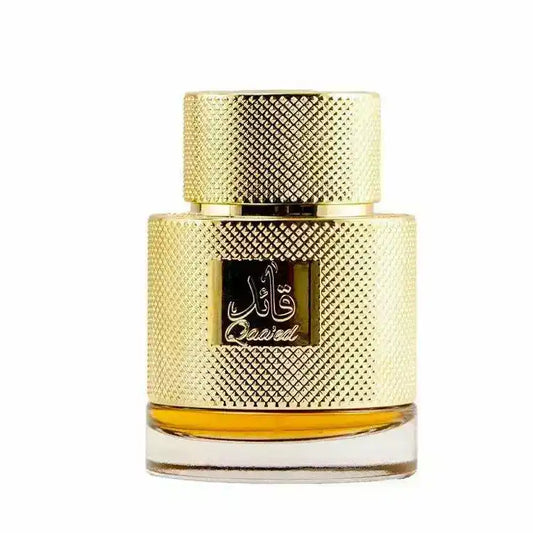 Gold textured perfume bottle with Arabic script and clear base, Middle Eastern fragrance.