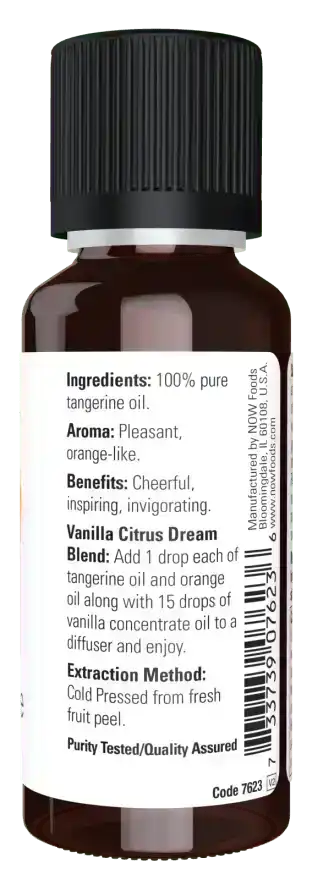 Brown glass bottle of pure tangerine essential oil with a black cap and ingredient label visible.
