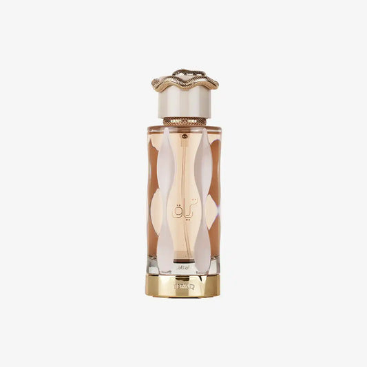 Elegant Middle Eastern perfume bottle with gold accents and Arabic script