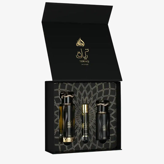 Teriaq Intense luxury perfume gift set with three elegant black bottles in a decorative box, featuring Arabic script and gold accents.