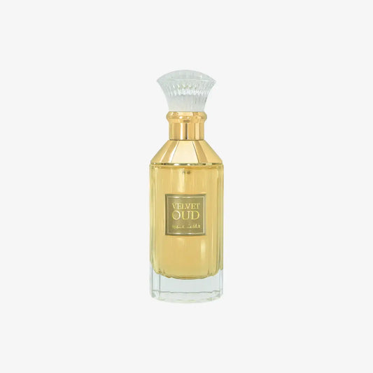 Gold Velvet Oud perfume bottle with clear glass cap on white background