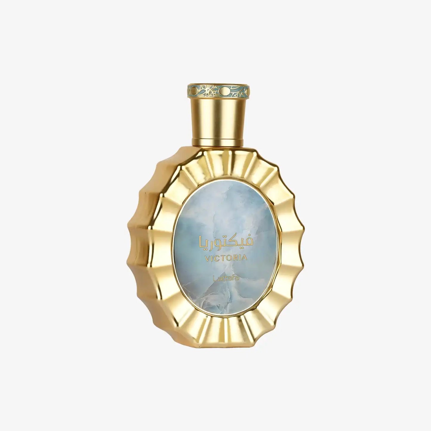 Gold decorative perfume bottle labeled Victoria with Arabic script, elegant presentation