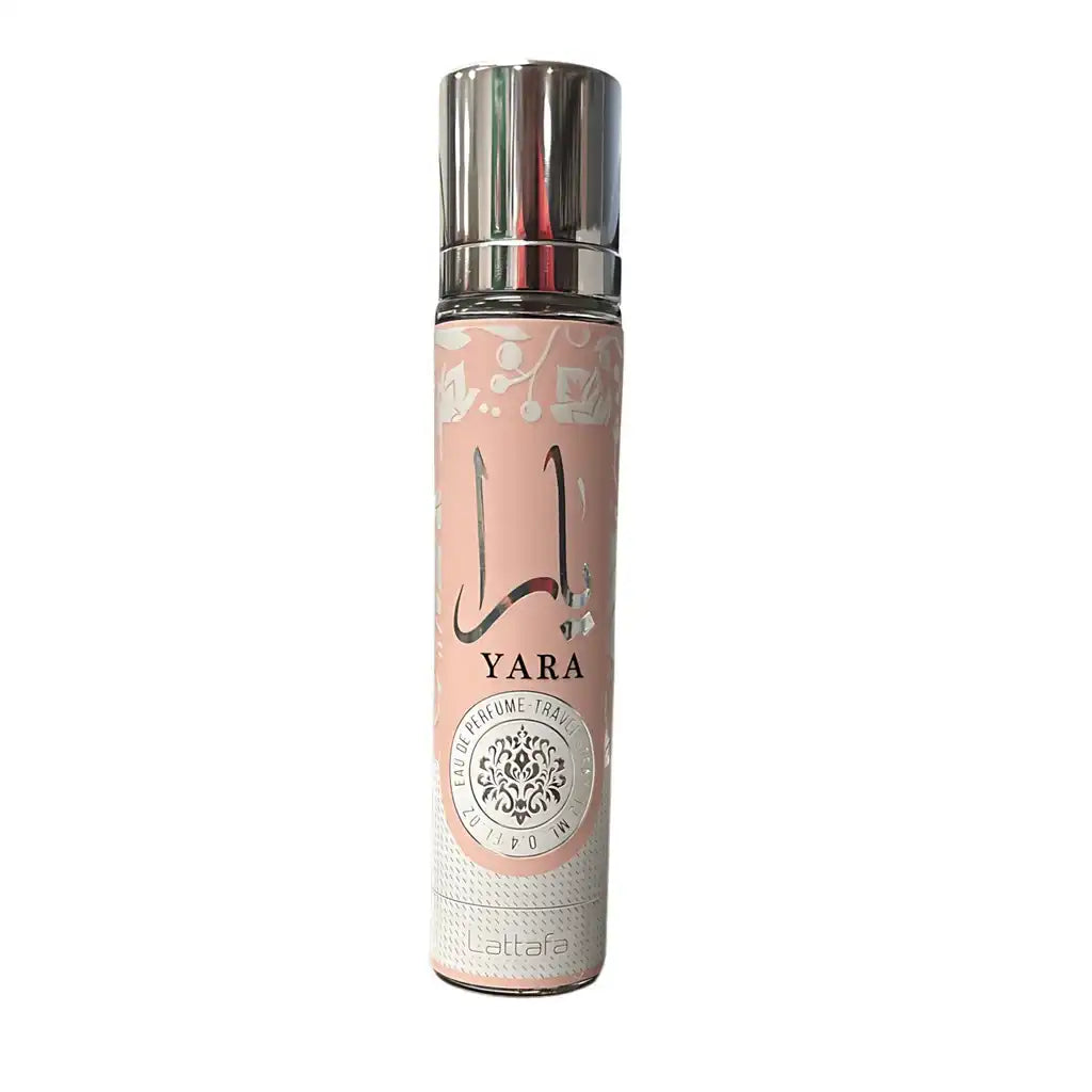 Yara pink cylindrical perfume spray can with silver cap and Arabic script