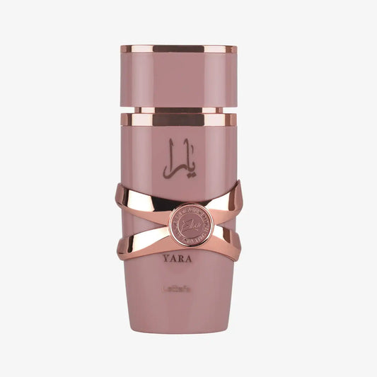 Elegant pink and gold Yara Elixir perfume bottle with Arabic script and metallic accents