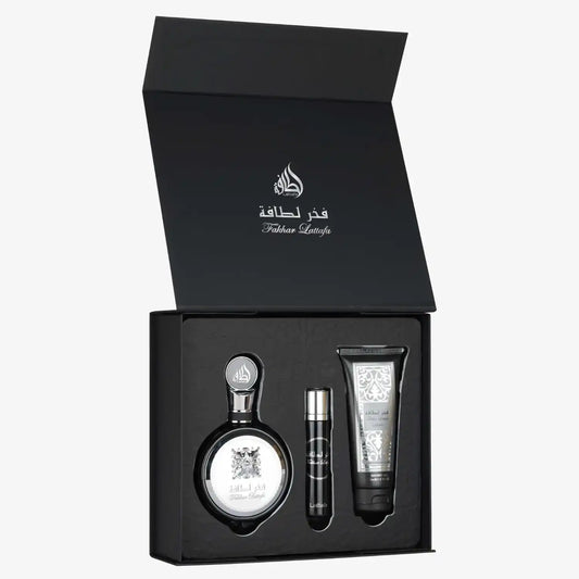 Luxury Middle Eastern perfume gift set with bottle, spray, and lotion in black box