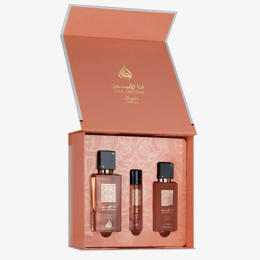 Middle Eastern perfume gift set with three coral-colored bottles in an elegant box