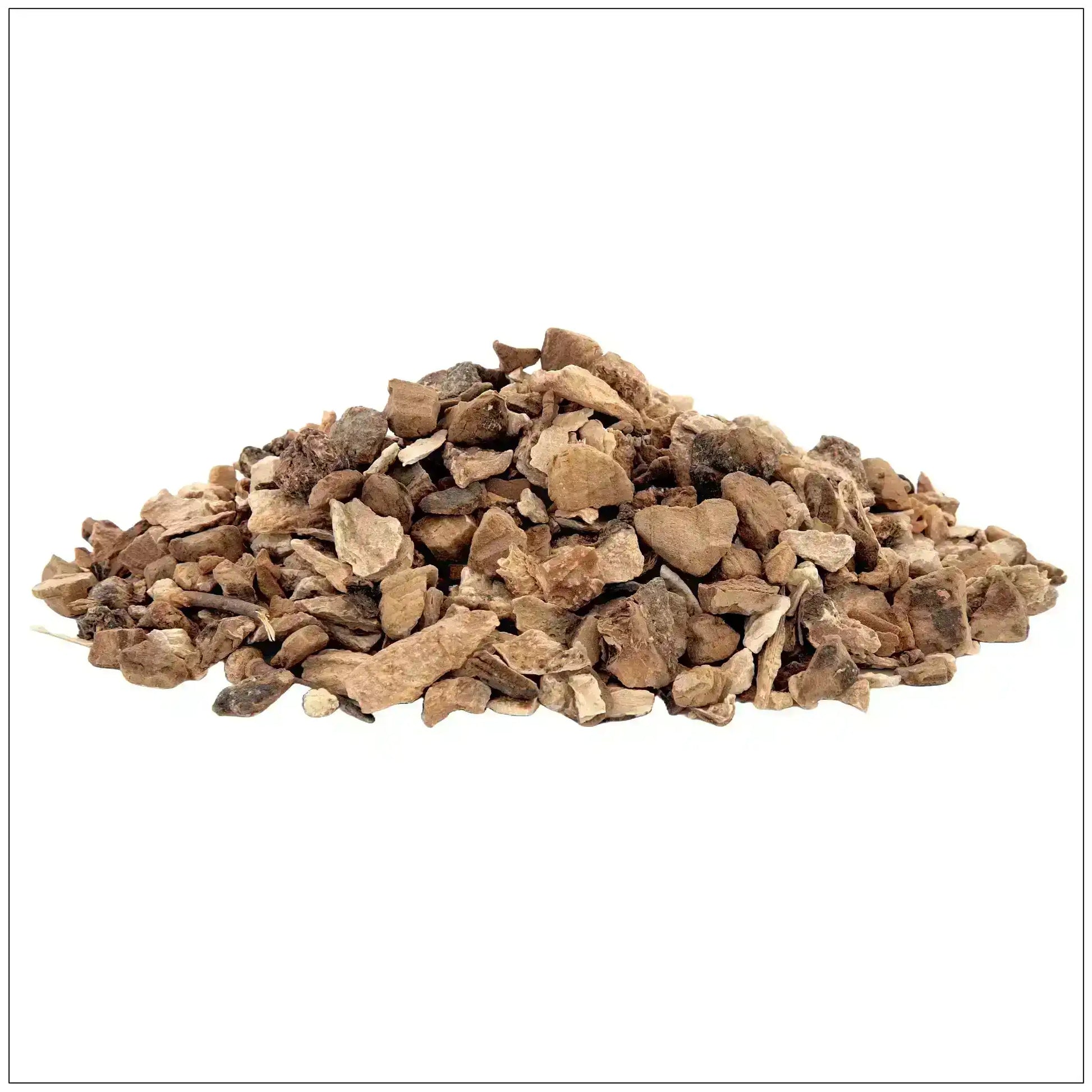 Dried wild yam root pieces piled on white background, Middle Eastern herbal ingredient